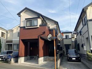 川口市　外壁・基礎塗装・屋根カバー工事　こだわりの色選びで高級感ある仕上がりに