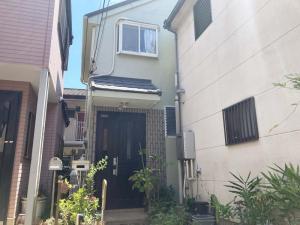 足立区　外壁塗装・屋根カバー工事　グリーンが爽やかな外観に！無機塗料で美観を保つ